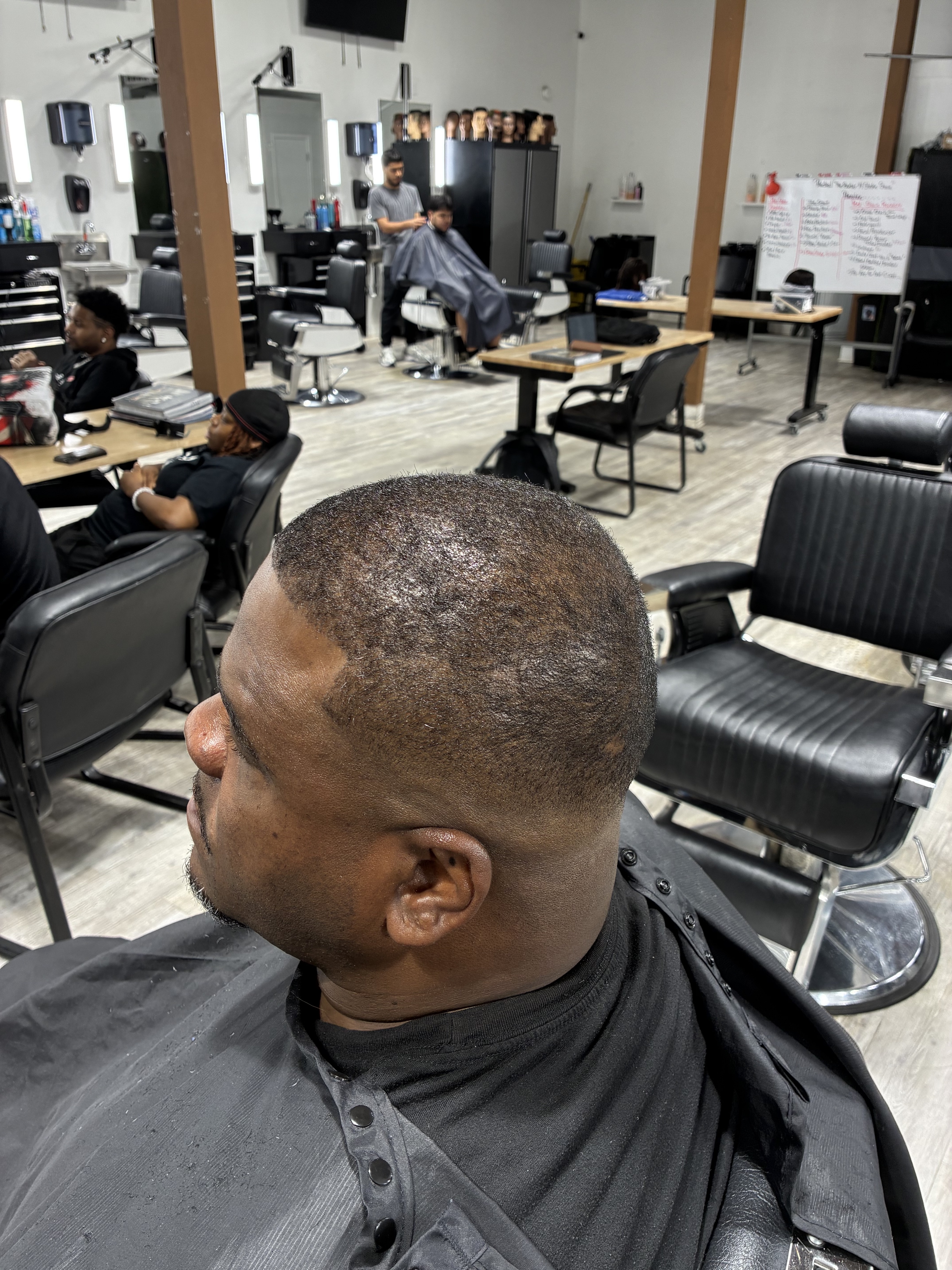 Clean close haircut and beard finish